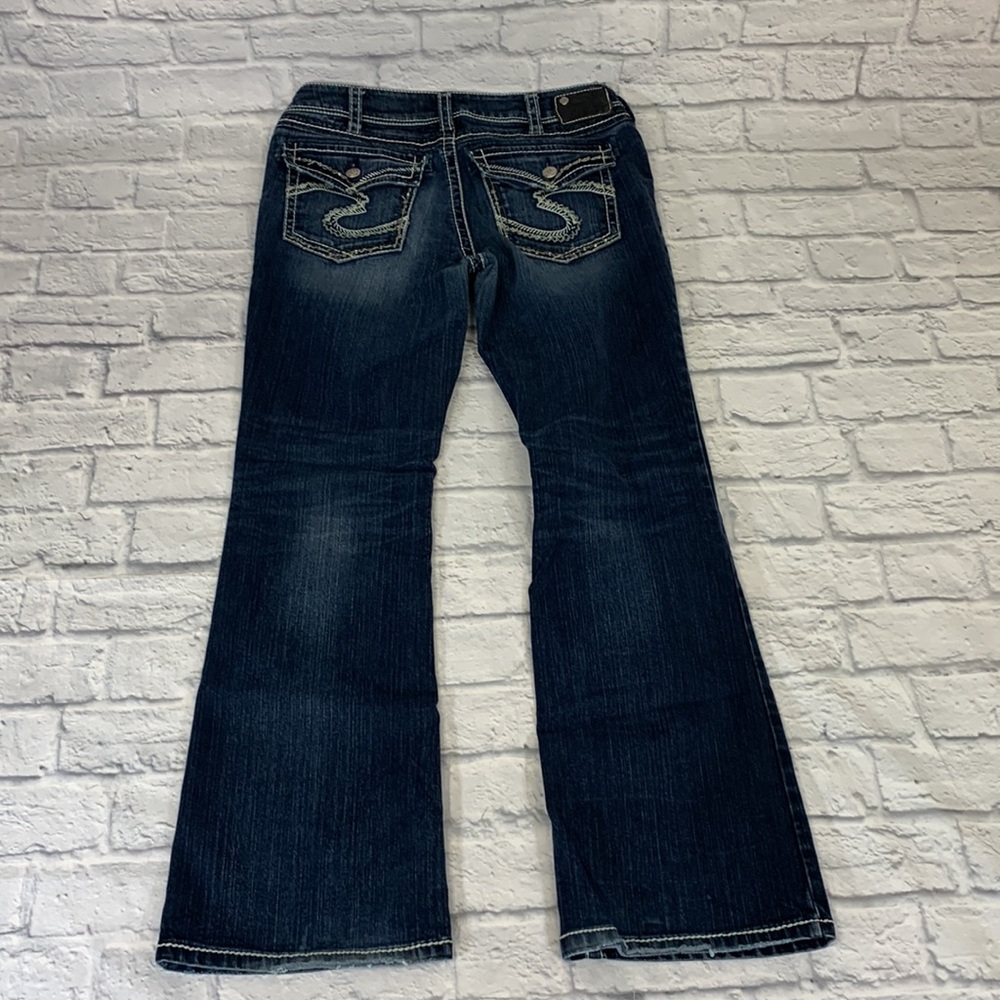 Silver Jeans Suki Flap. Bootcut Size 33. Medium wash denim. Stretch.